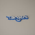 Blue name keyring with white raised letters reading Tangeni