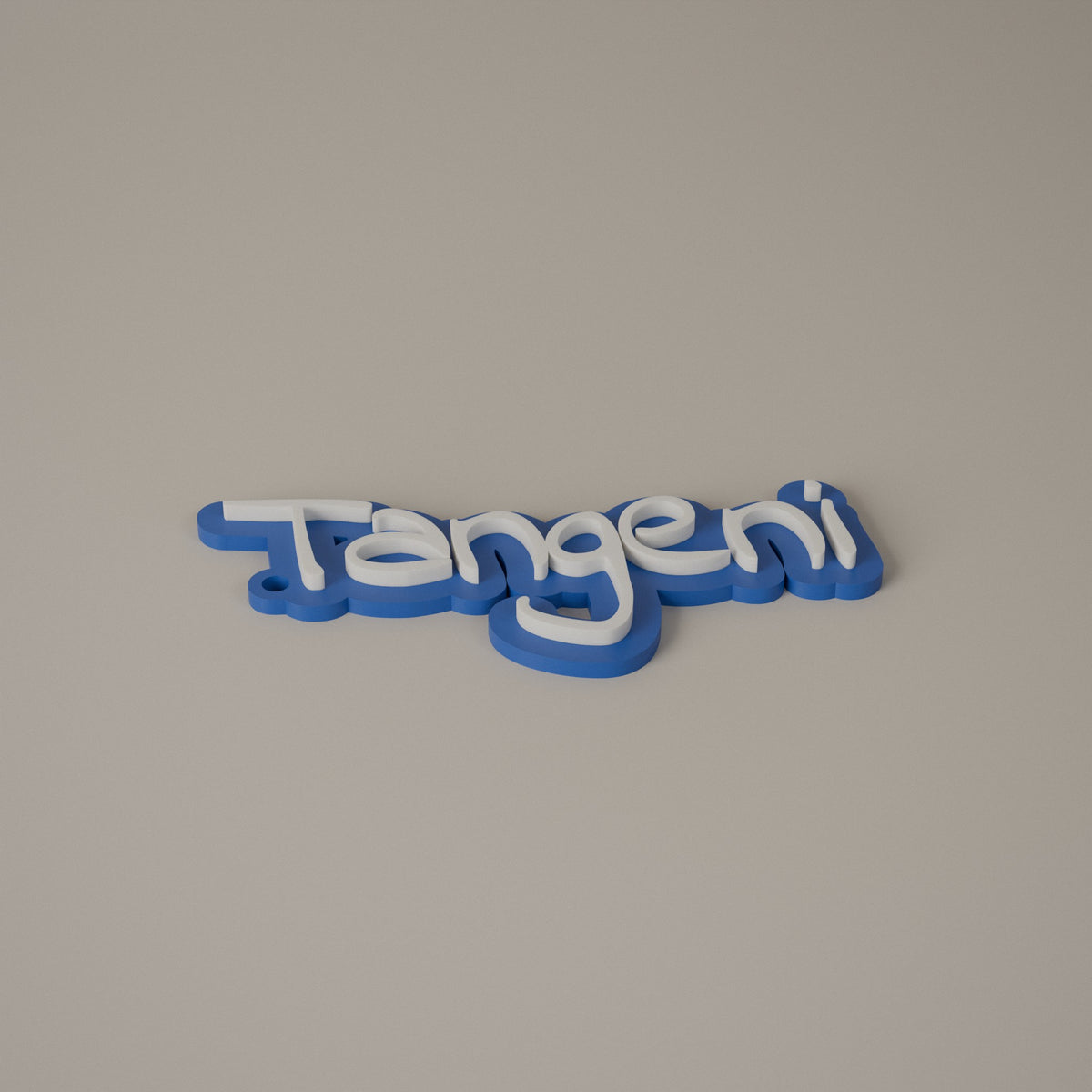 Blue name keyring with white raised letters reading Tangeni